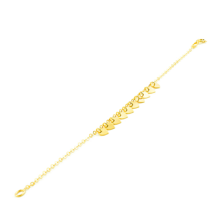 Pulsera oro amarillo con corazones lisos en brillo